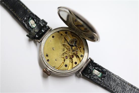 A gentlemans early 20th century silver manual wind wrist watch, retailed by Henry Birks & Sons.